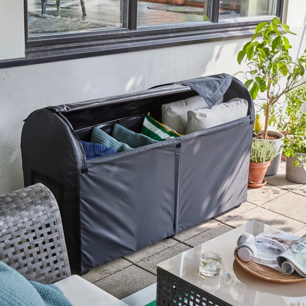 A black TOSTERÖ storage box, outdoor outside