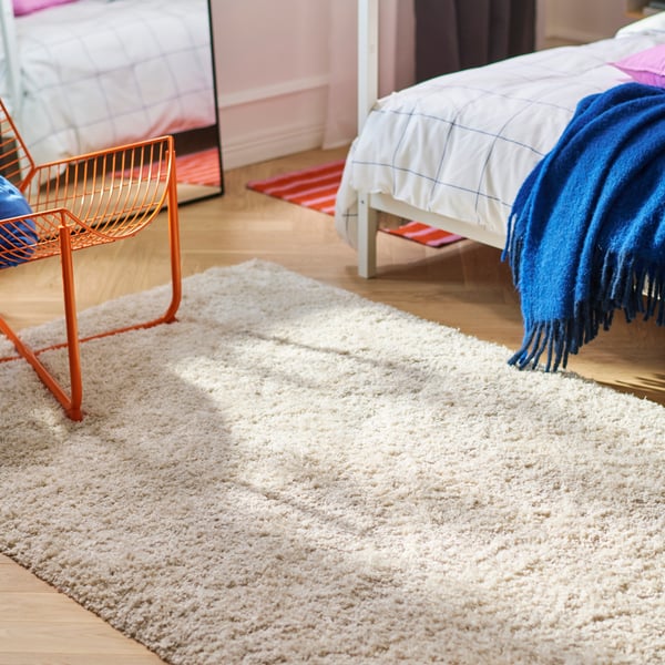 A white VOLLERSLEV rug, high pile