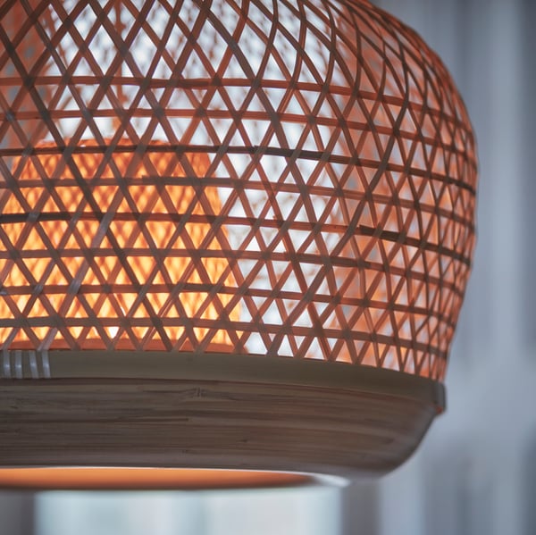 A bamboo/handmade MISTERHULT pendant lamp in the living room