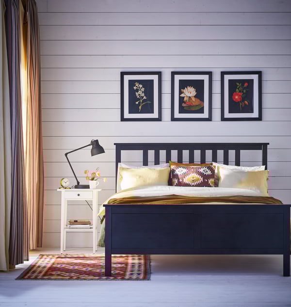 A white stain HEMNES bedside table in the bedroom