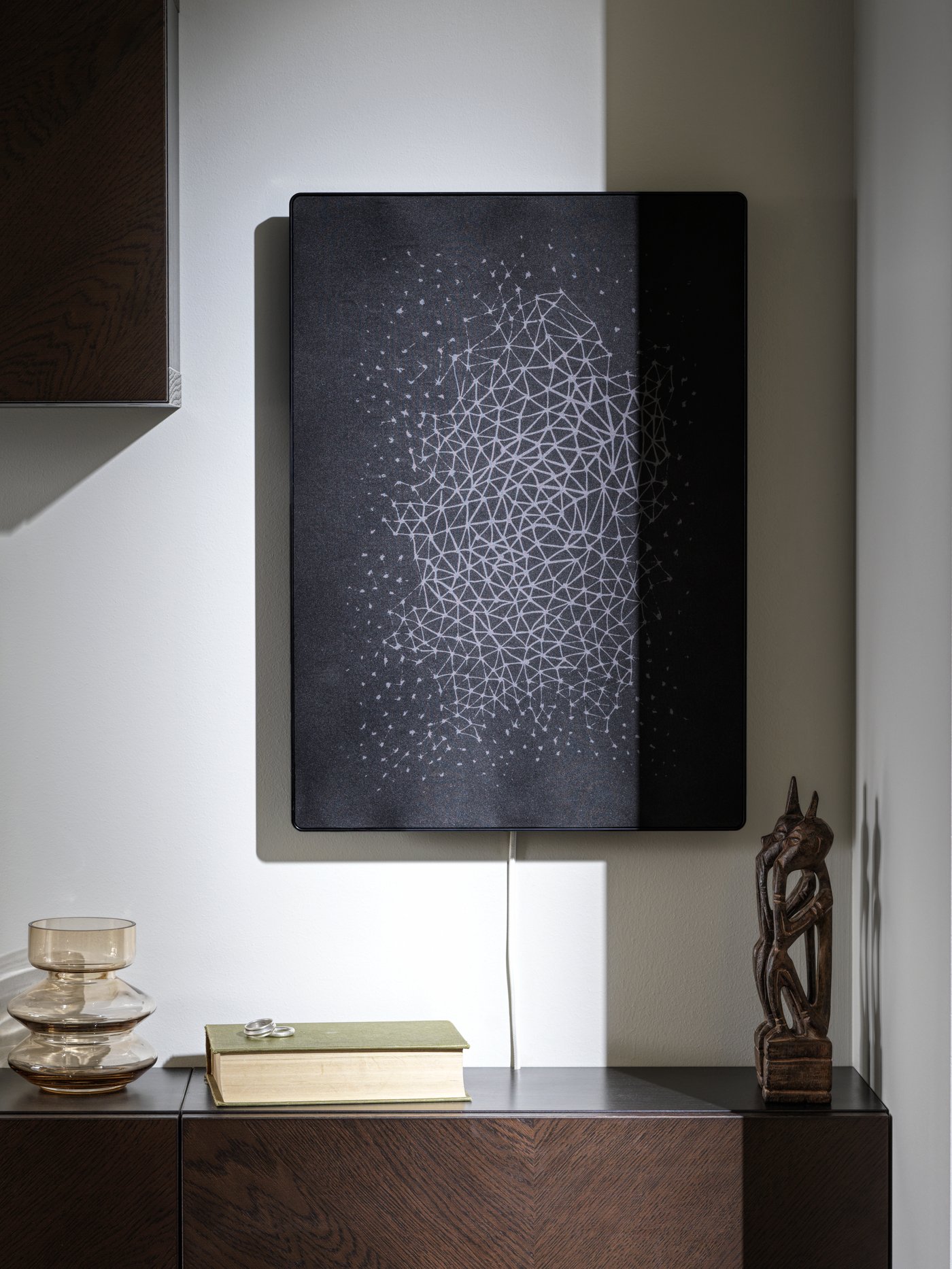 A black/smart SYMFONISK picture frame with WiFi speaker
