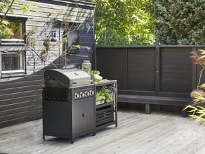 Een roestvrijstalen/buiten GRILLSKÄR gasbarbecue met zijbrander