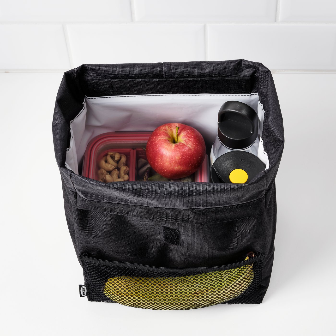 A black FRAMTUNG lunch bag
