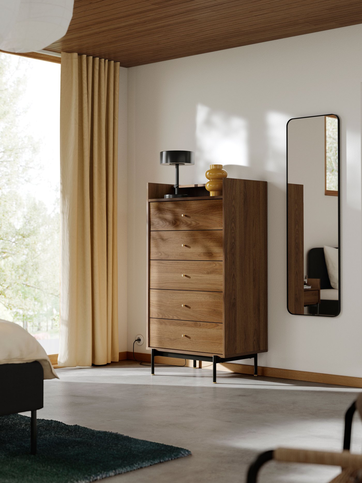 A brown walnut effect RÅDMANSÖ chest of 5 drawers