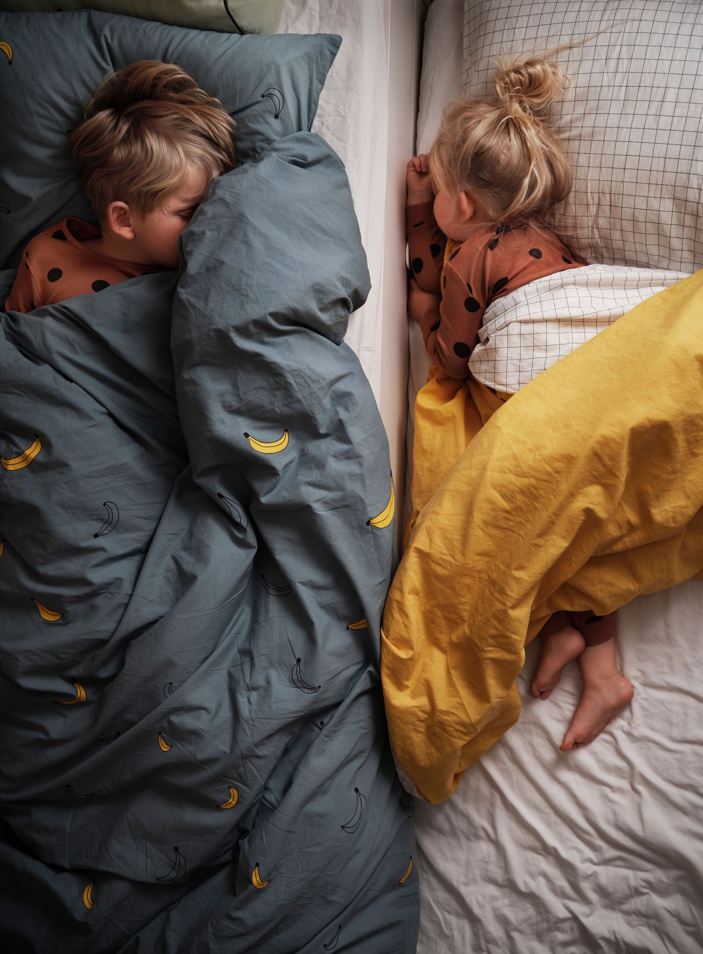 A white SLÄKT bed frame with underbed and storage