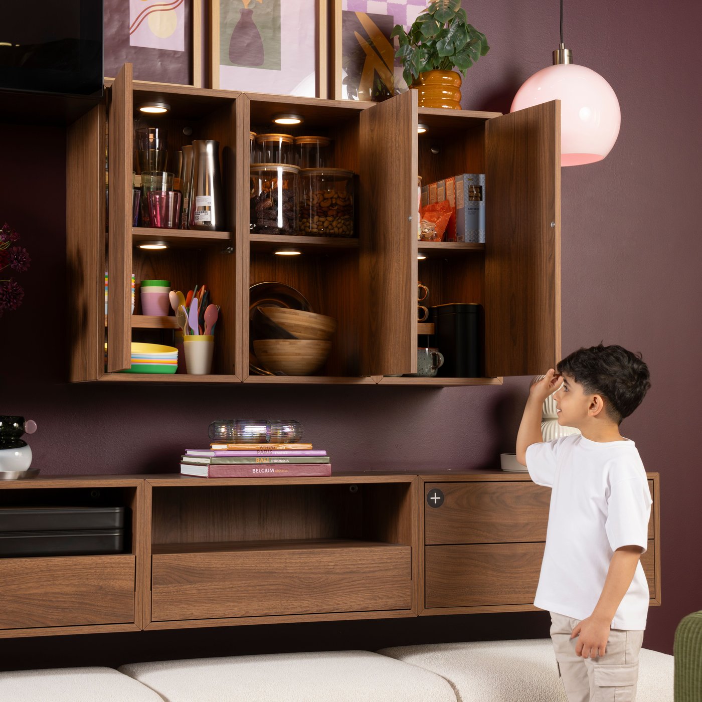 A with 2 drawers/brown walnut effect EKET wall-mounted storage combination in the living room