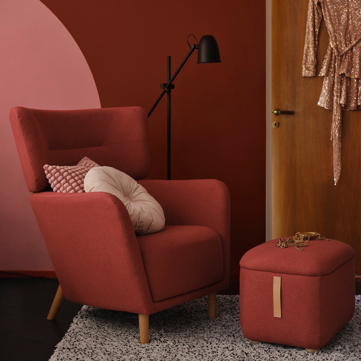 A Tonerud red OSKARSHAMN footstool with storage