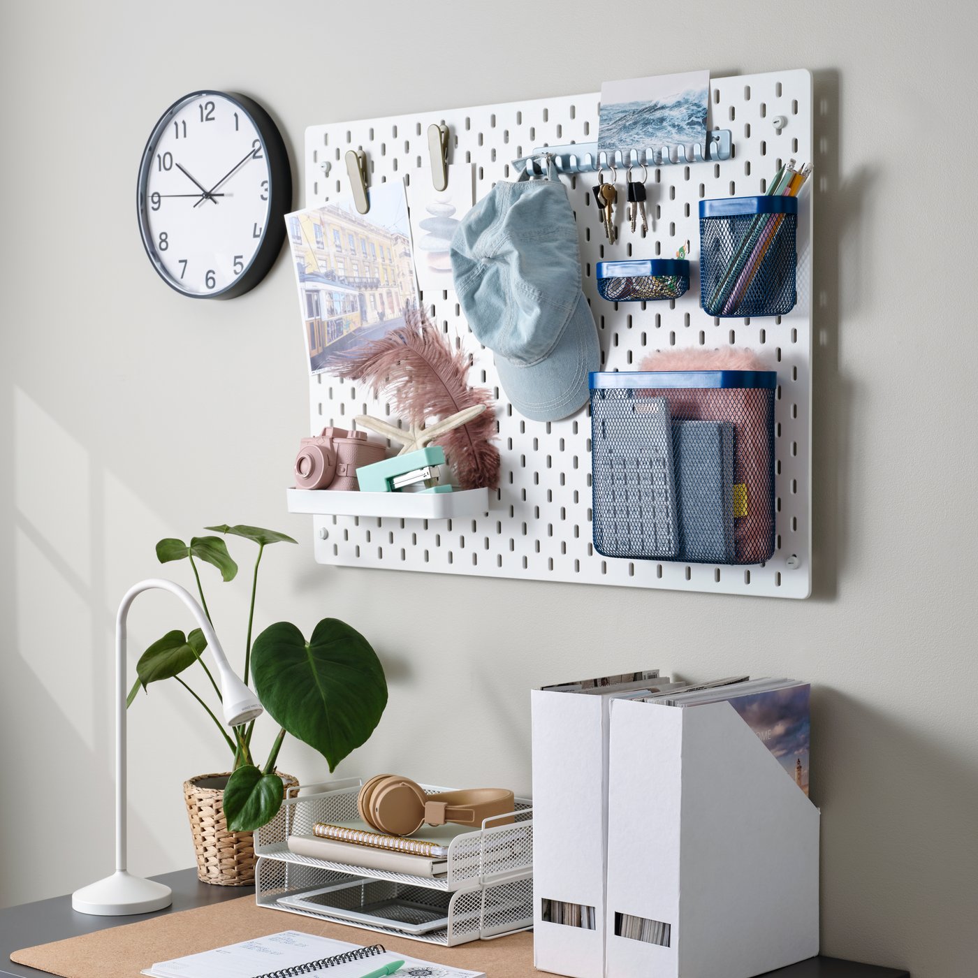 A dark blue SKÅDIS storage basket