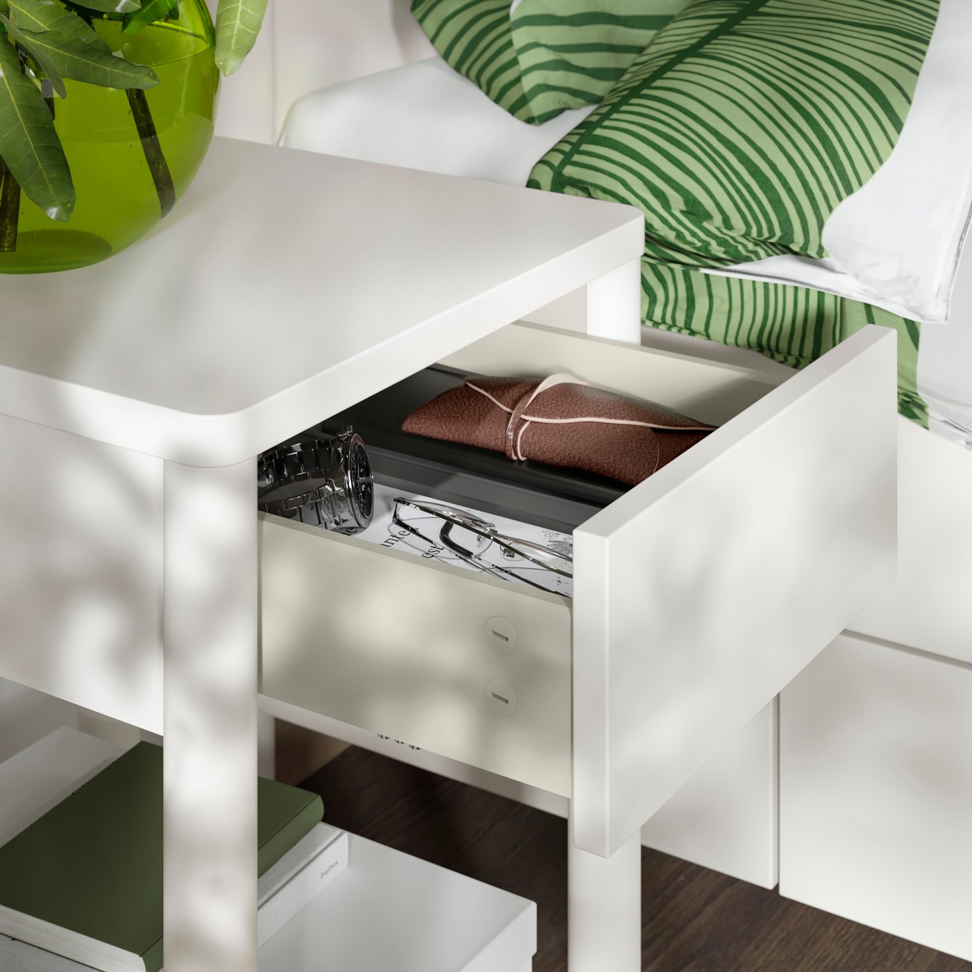 An off-white TONSTAD bedside table