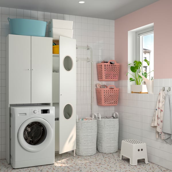 A white NYSJÖN cabinet for washing machine