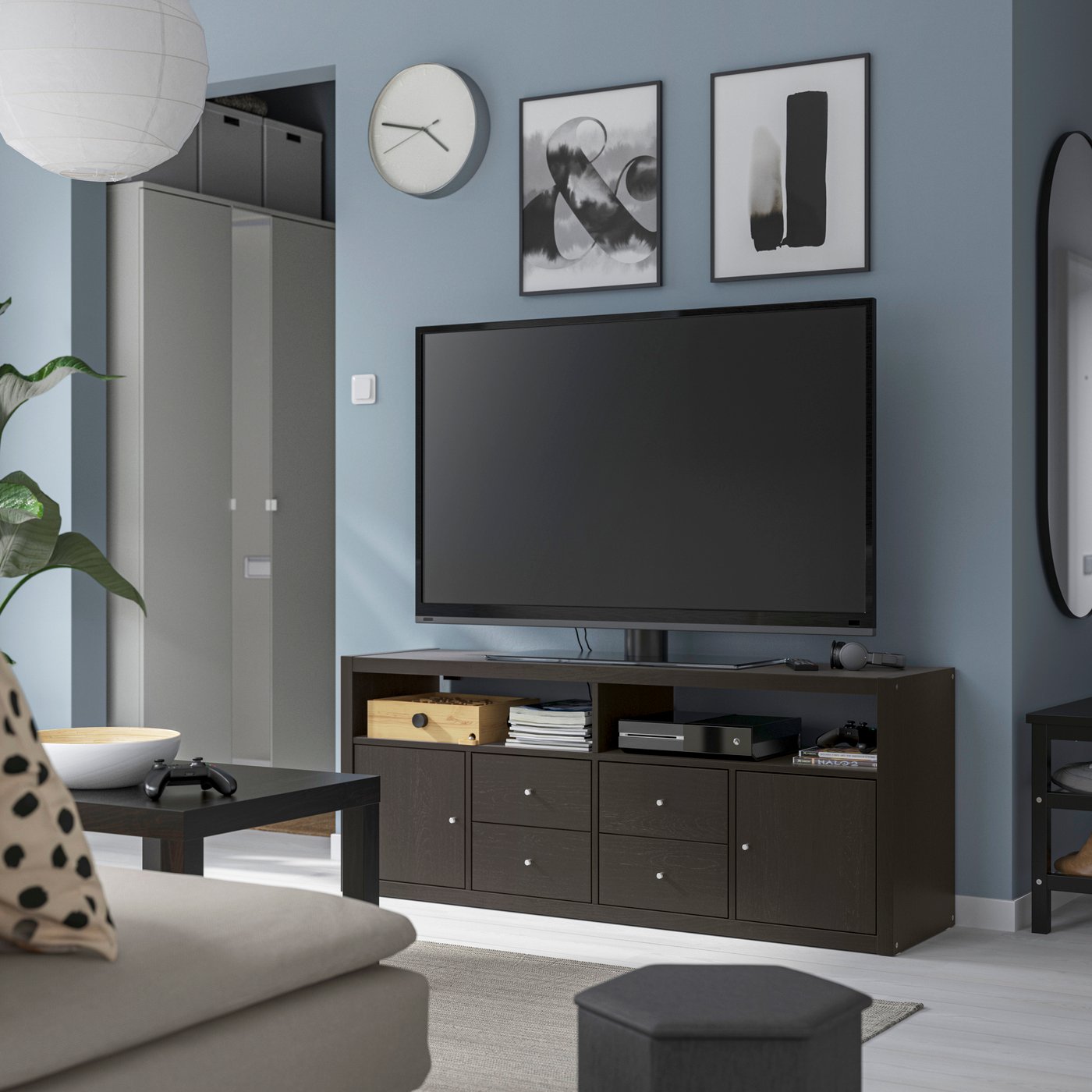 A black-brown KALLAX TV storage combination