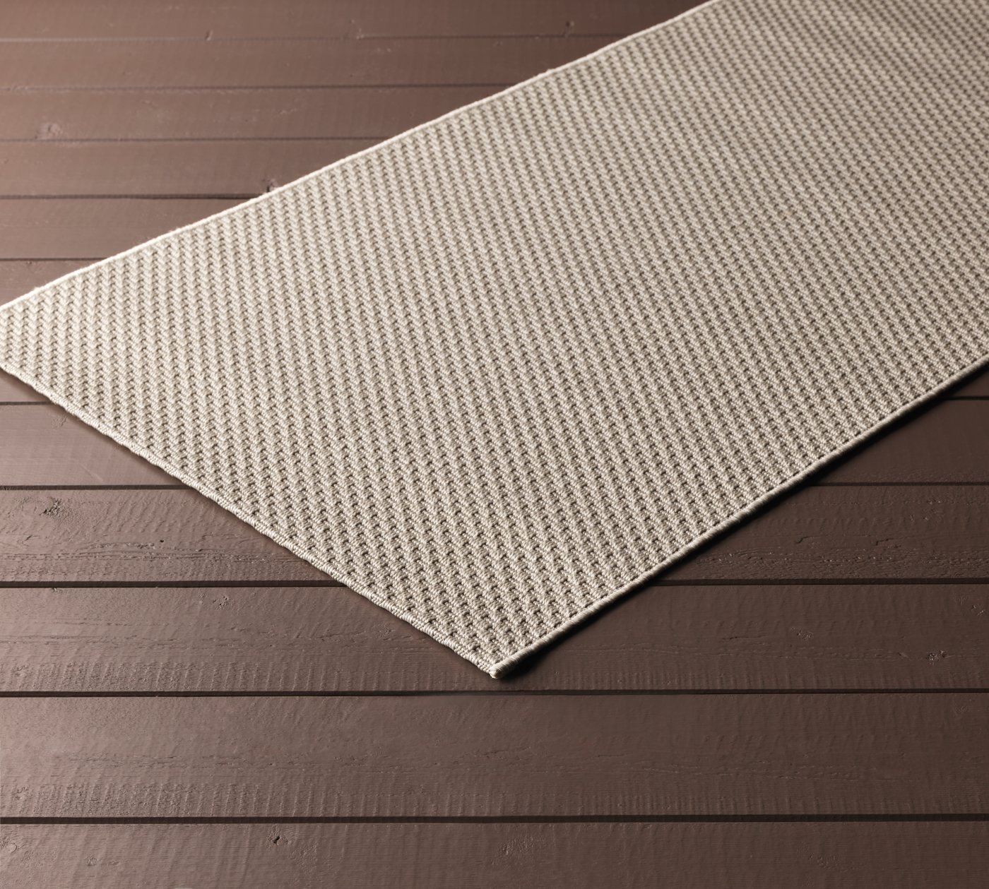 A beige MORUM rug flatwoven, in/outdoor