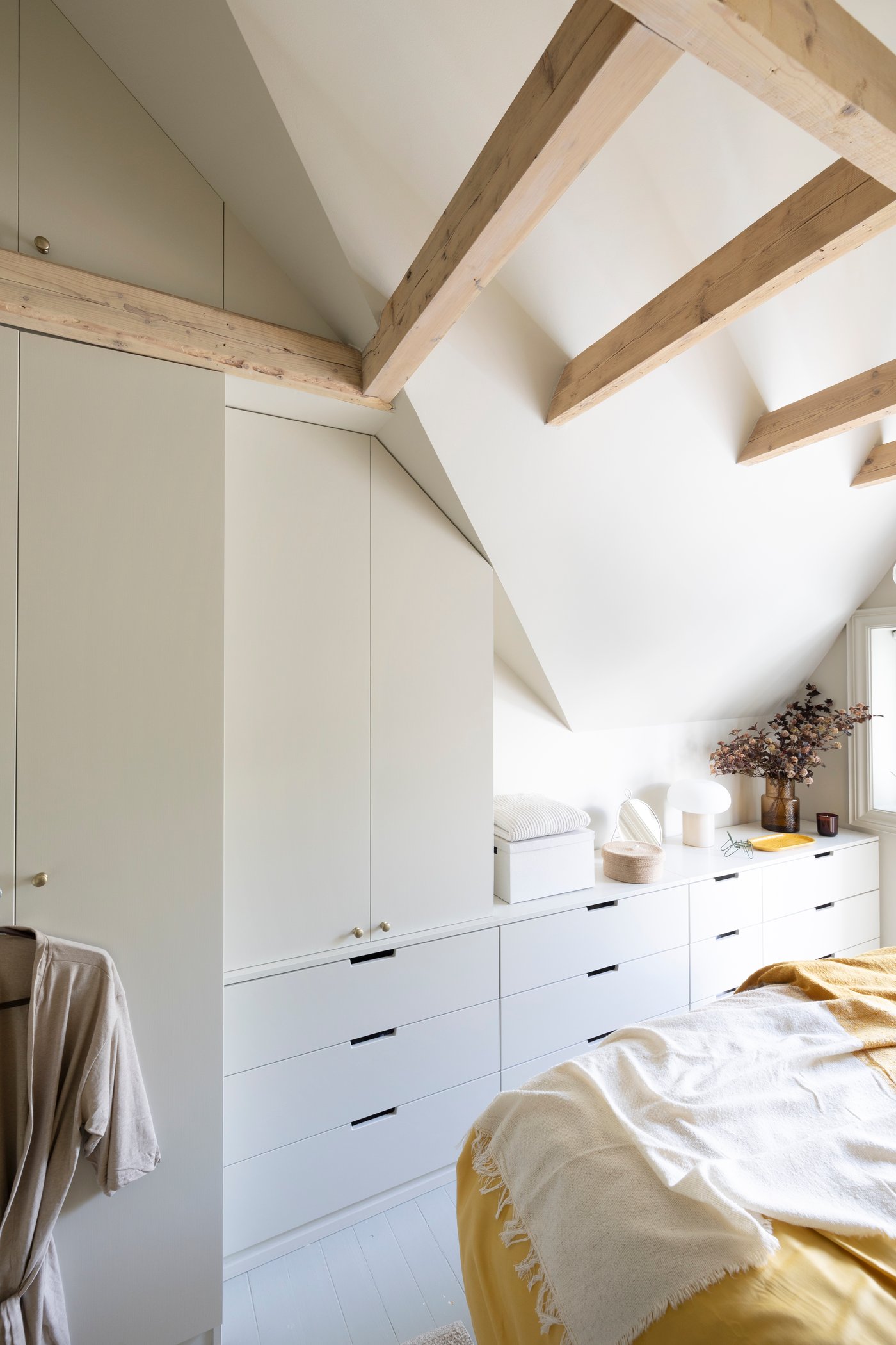 A dark yellow/off-white UGGLEFLY throw