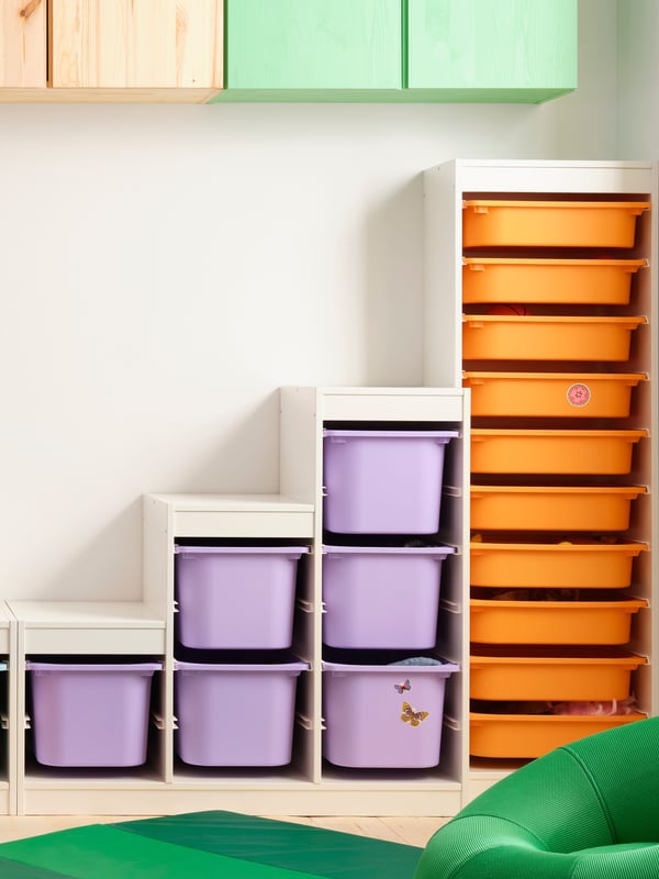 A pine IVAR shelving unit in the childrens room