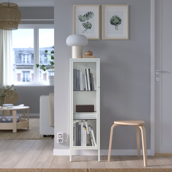 A metal/white BAGGEBO glass-door cabinet