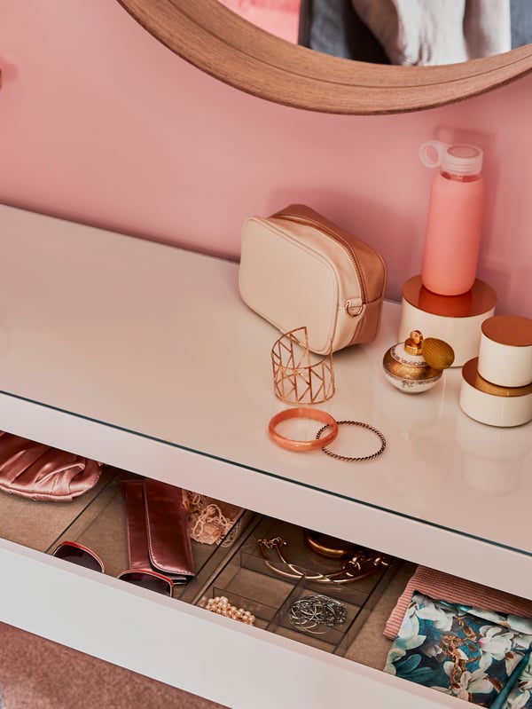 A white MALM dressing table in the bedroom