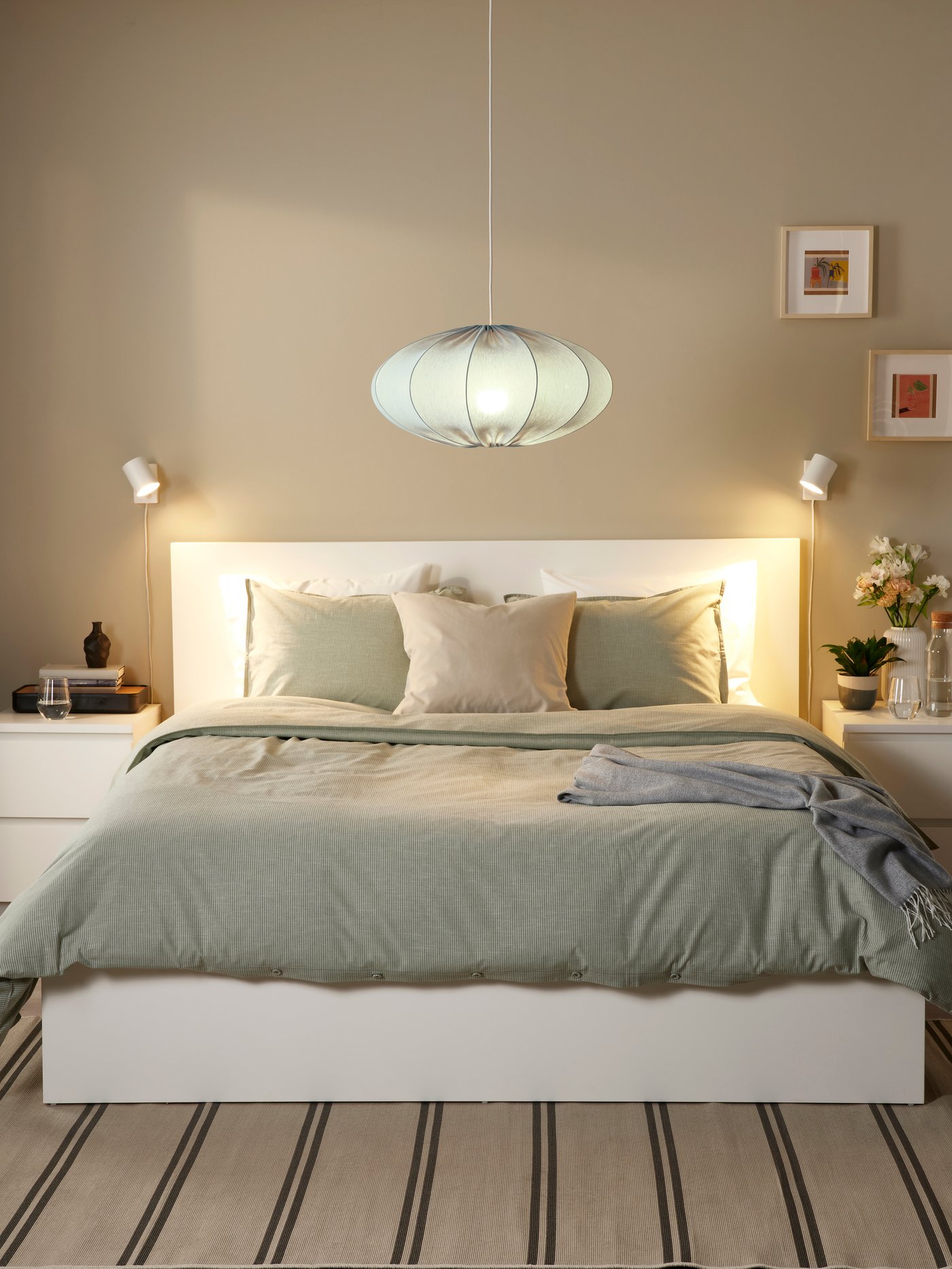 An oval turquoise REGNSKUR pendant lampshade