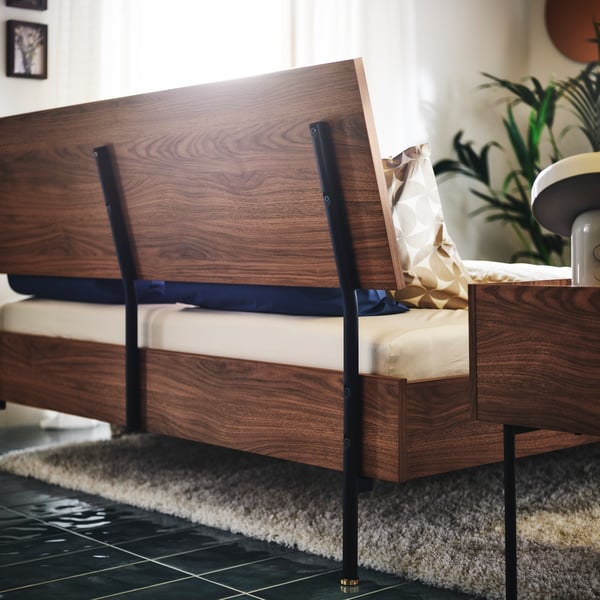 Close-up of the back of RÅDMANSÖ bedframe, showing the details that make it looks as nice from the back as from the front.