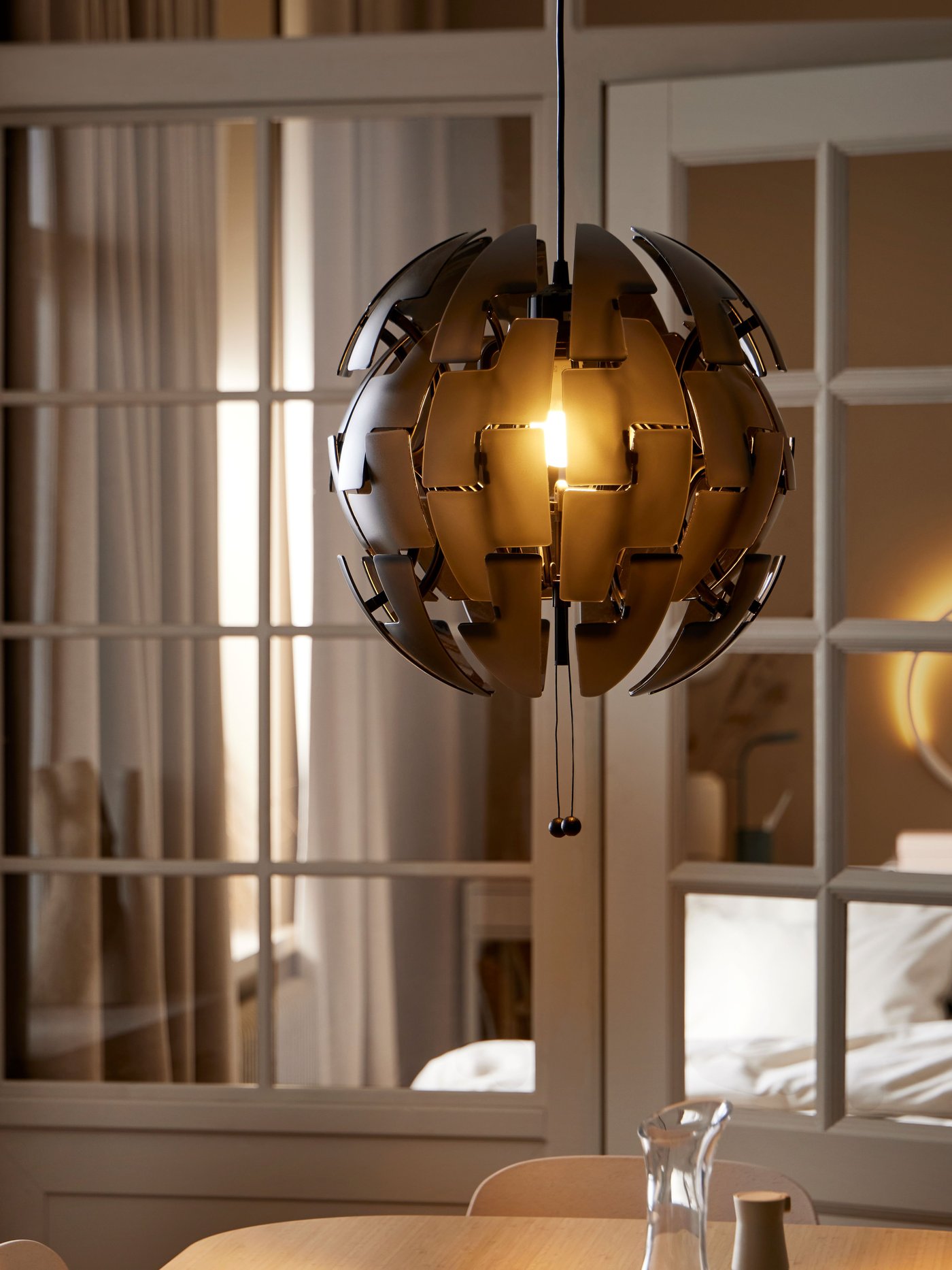 A clear glass STORSINT carafe