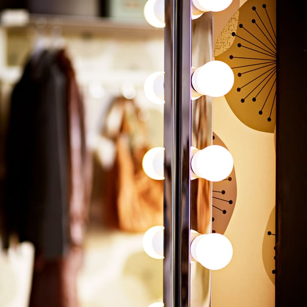 A chrome-plated MUSIK wall lamp