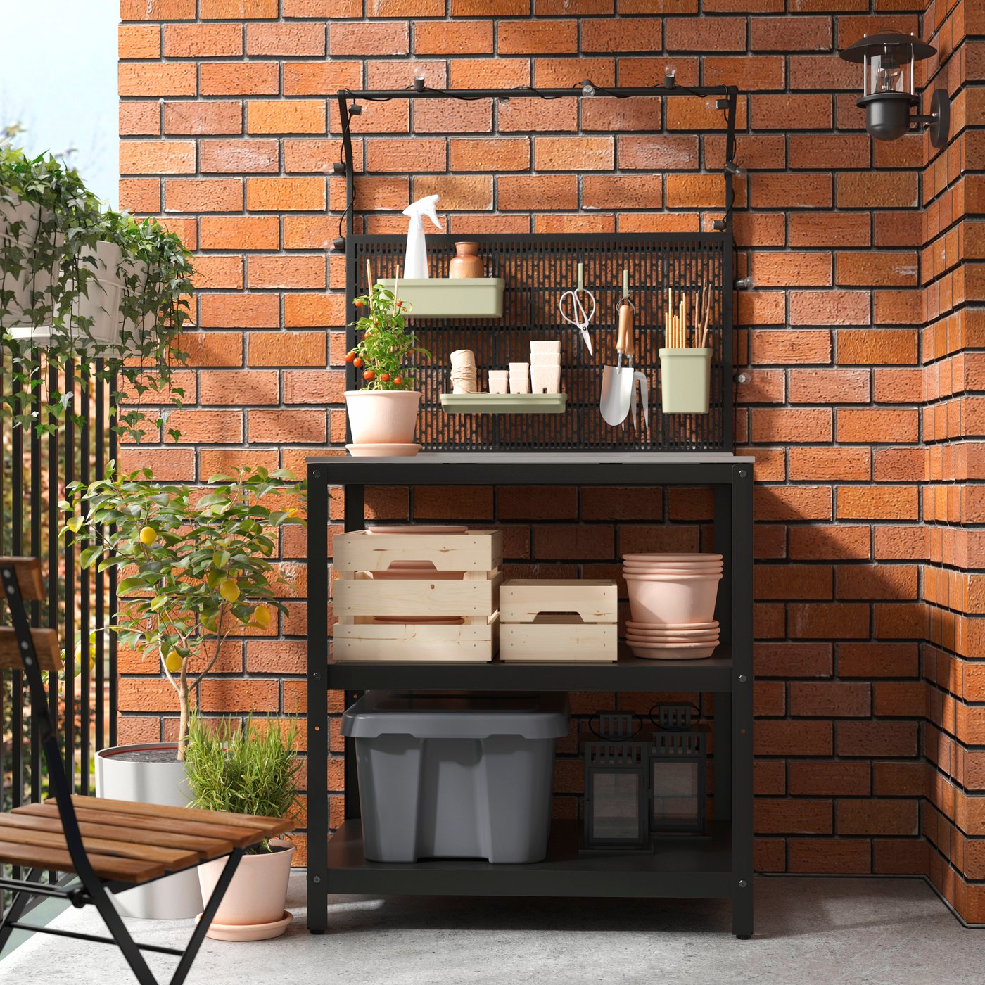 A stainless steel/outdoor GRILLSKÄR kitchen island w back panel