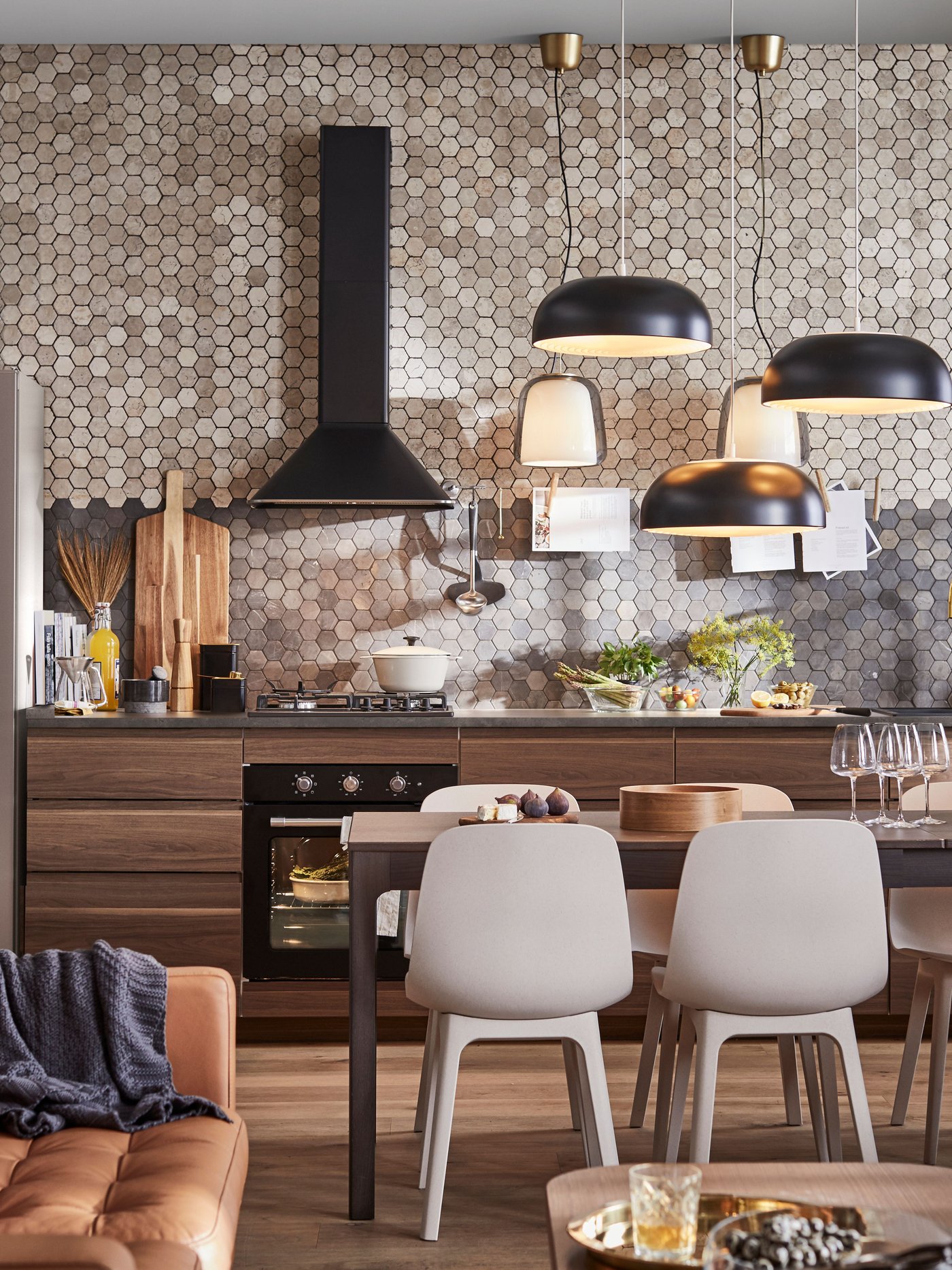 A black MATTRADITION wall mounted extractor hood in the kitchen