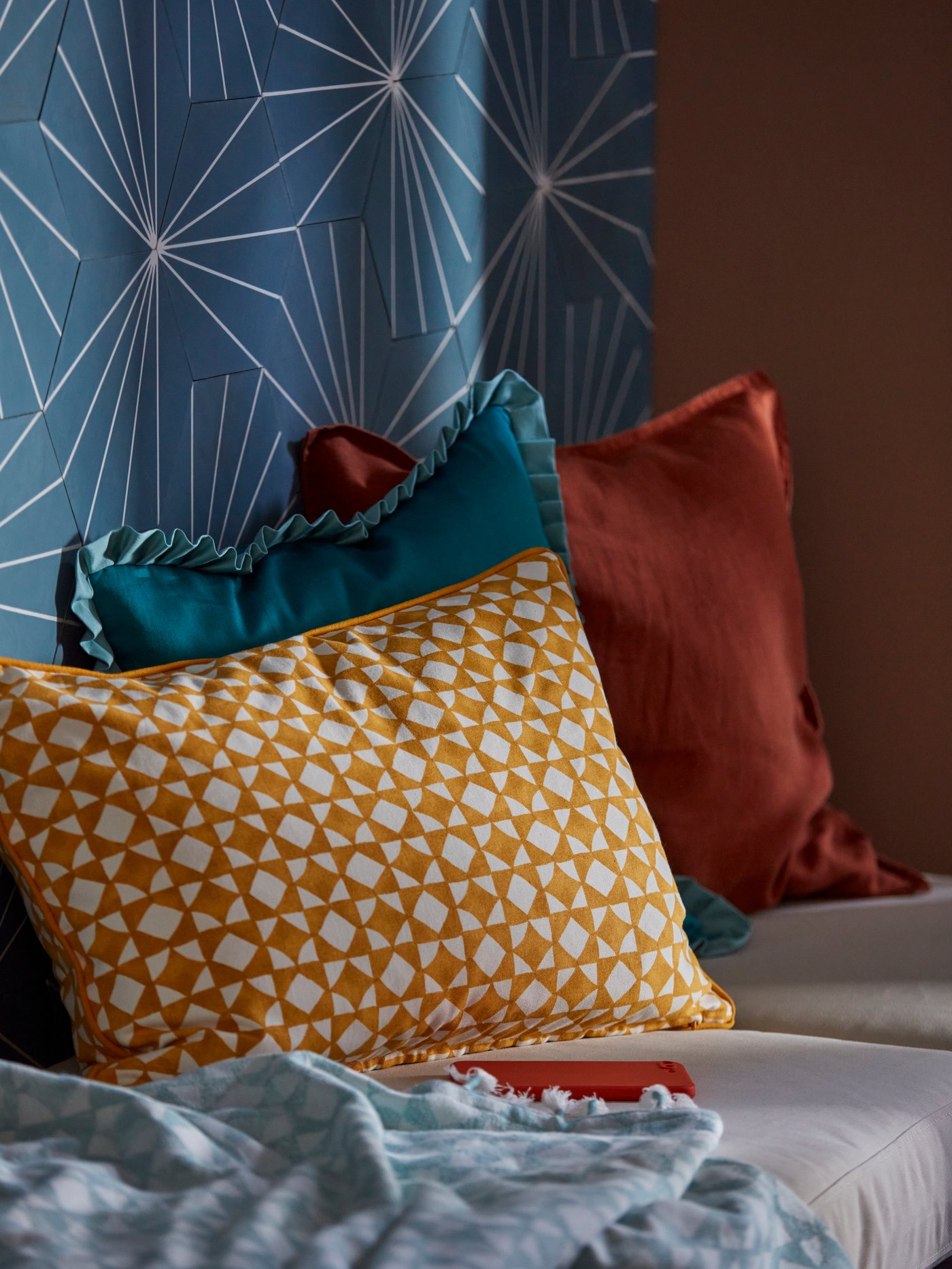 An yellow/white GOKVÄLLÅ cushion cover