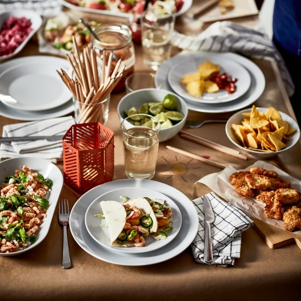 A brown-orange VÅRSYREN lantern for tealight