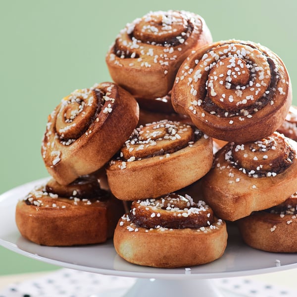 KAFFAEREP cinnamon buns on a plate.