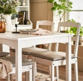 A white HAUGA chair