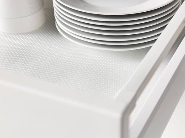 A transparent VARIERA drawer mat