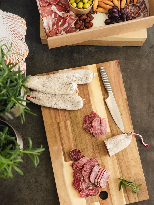 An acacia SKOGSTA chopping board