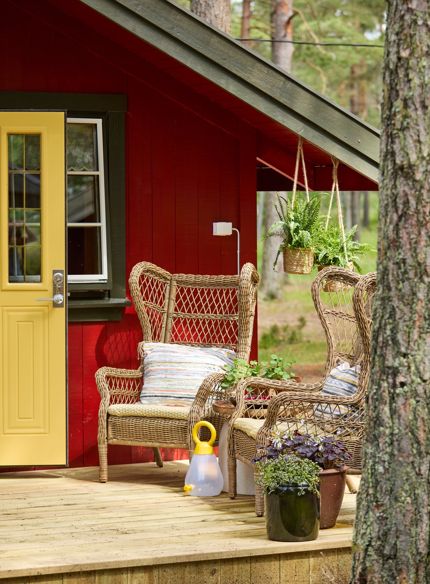 A brown RISHOLMEN wing chair, in/outdoor