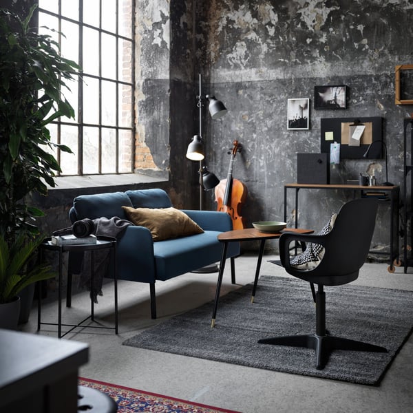 A Knisa medium blue GLOSTAD 2-seat sofa in the living room