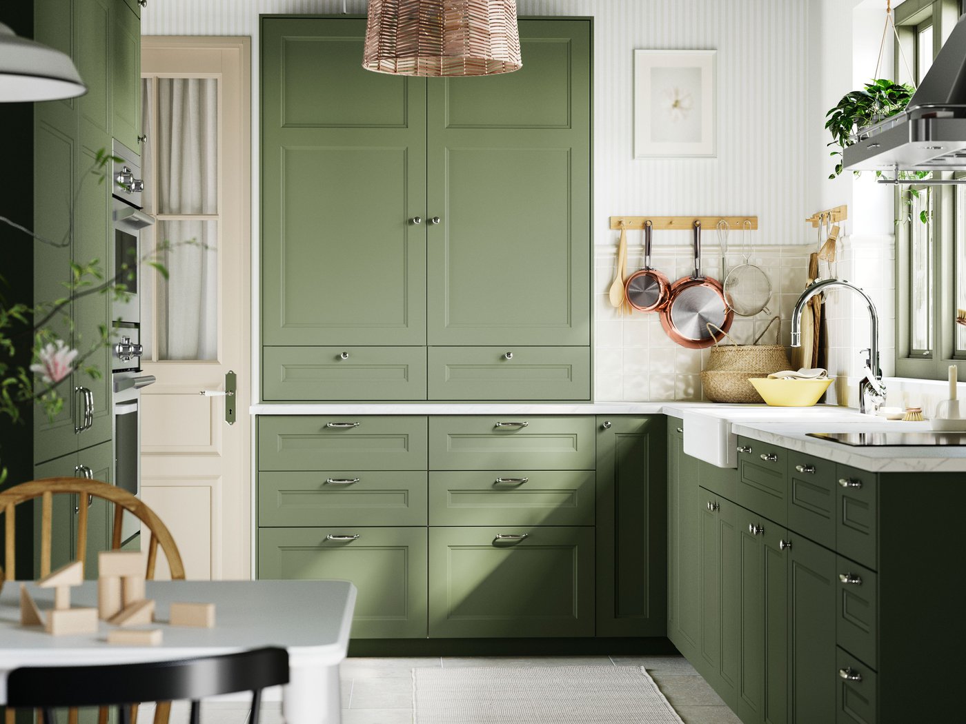 A grey-green AXSTAD door in the kitchen.