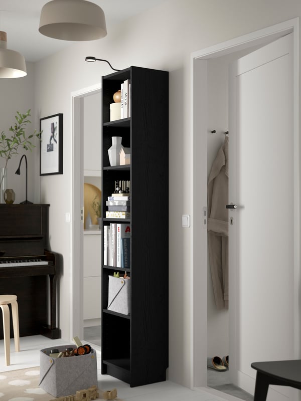 A black oak effect BILLY bookcase in the hallway