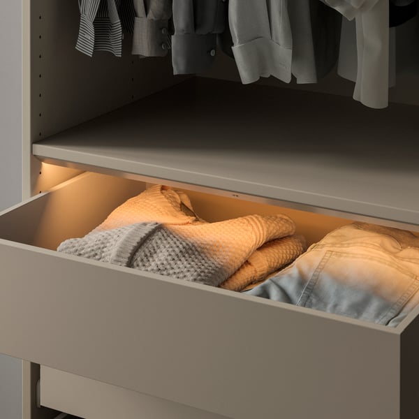 A dimmable beige ÖVERSIDAN LED wardrobe lighting strp w sensor