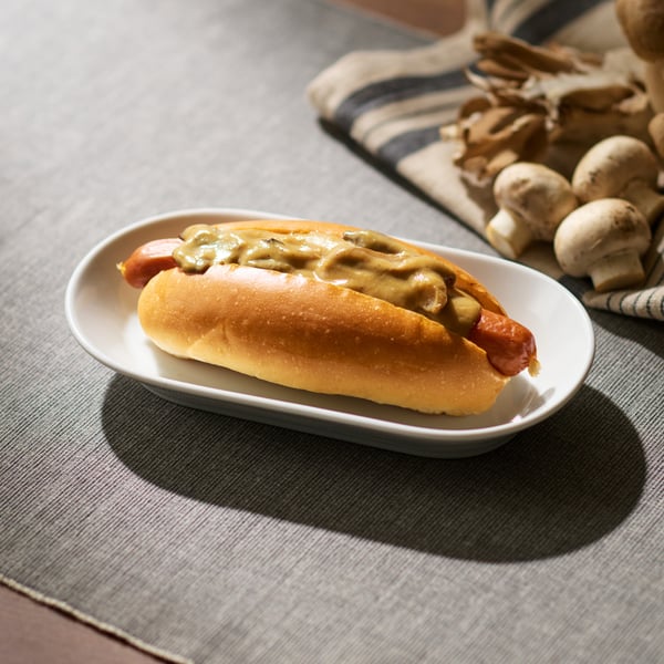 Hot dog with mushroom toppings