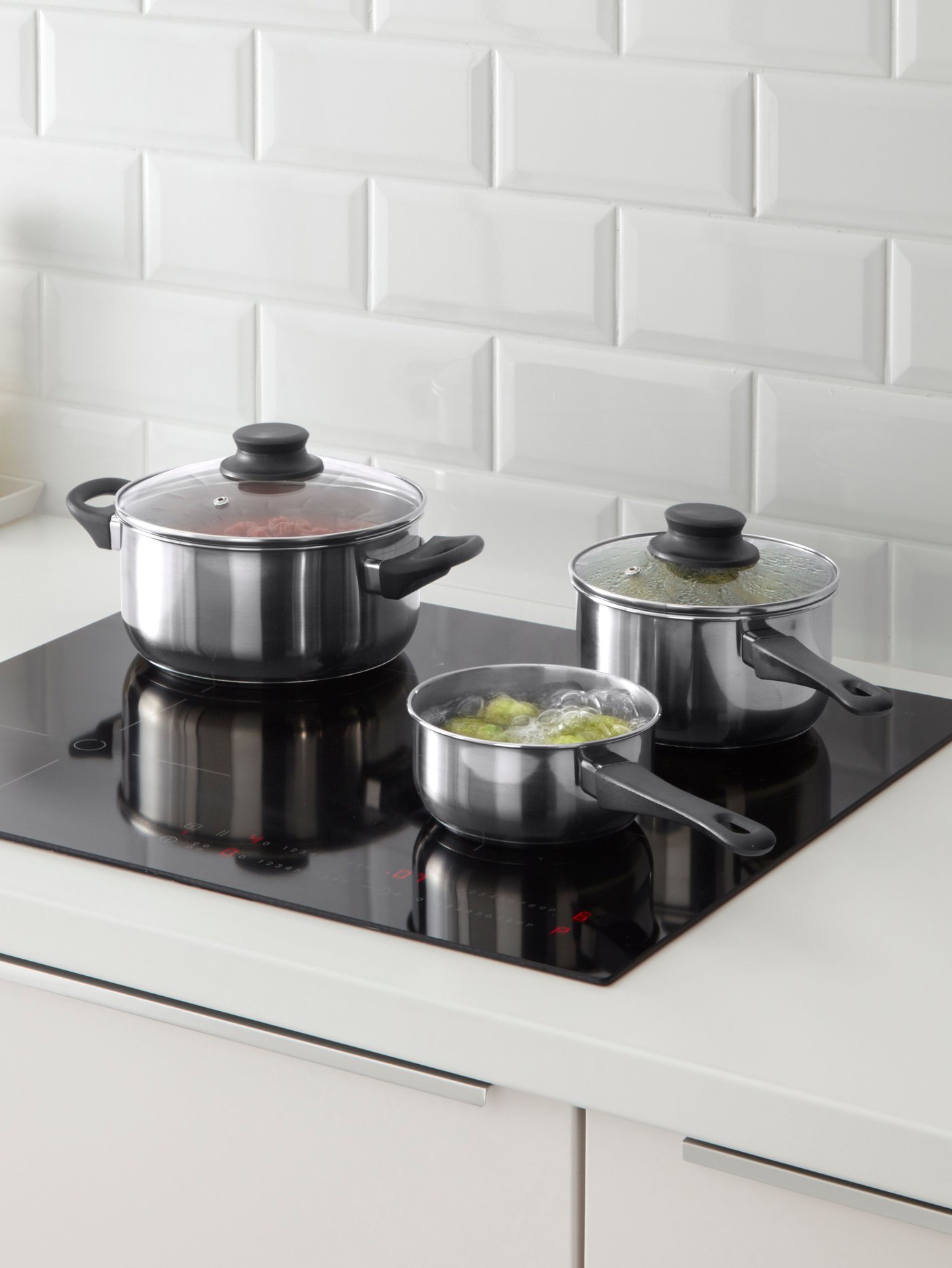 A glass/stainless steel ANNONS pot with lid