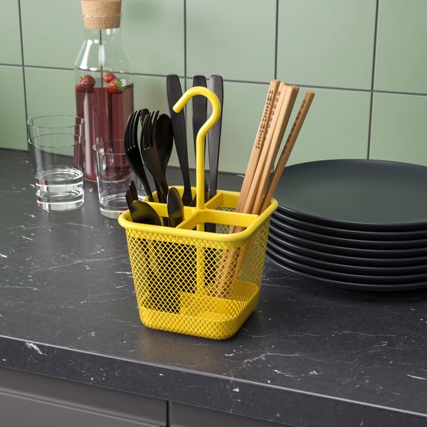 An yellow UPPDATERA cutlery caddy