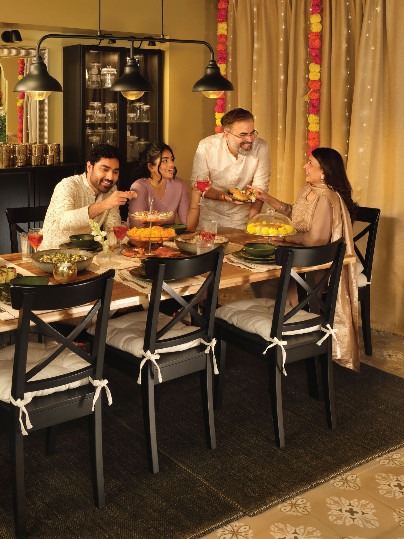 An acacia/black NORDVIKEN table and 6 chairs
