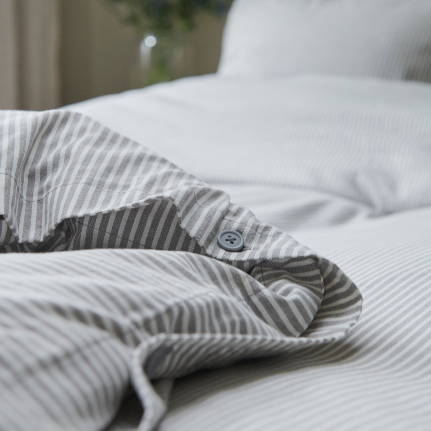 A grey white/stripe SOLFIBBLA duvet cover and pillowcase