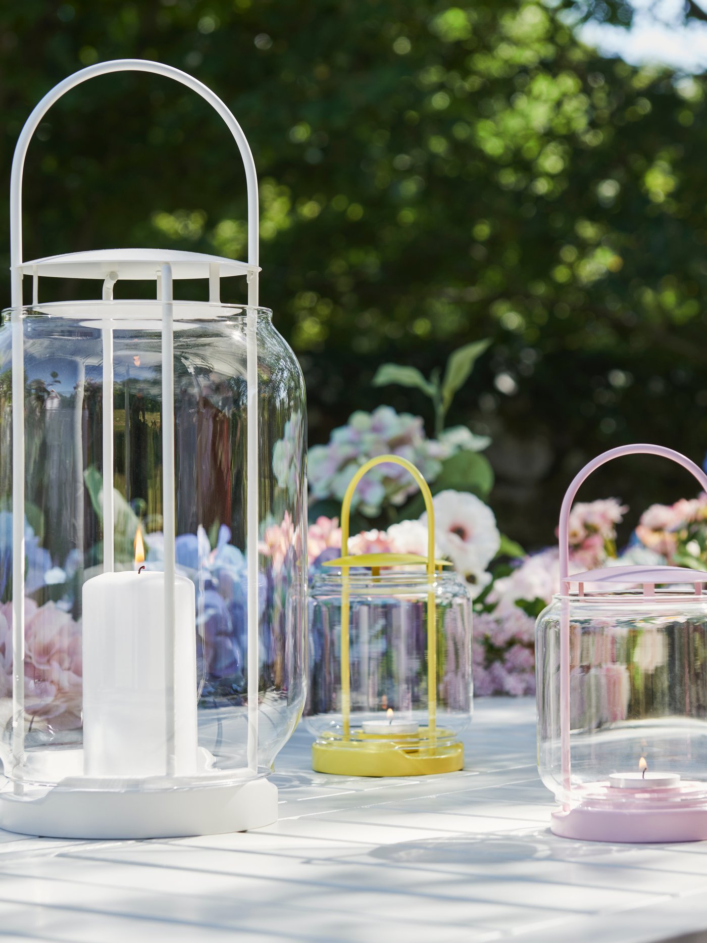 A white TOFSAND lantern for pillar candle, in/out
