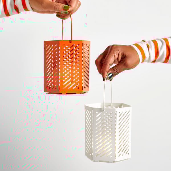 A brown-orange VÅRSYREN lantern for tealight in the NA