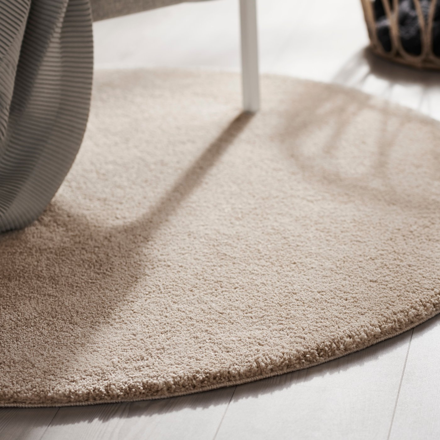 An off-white STOENSE rug, low pile