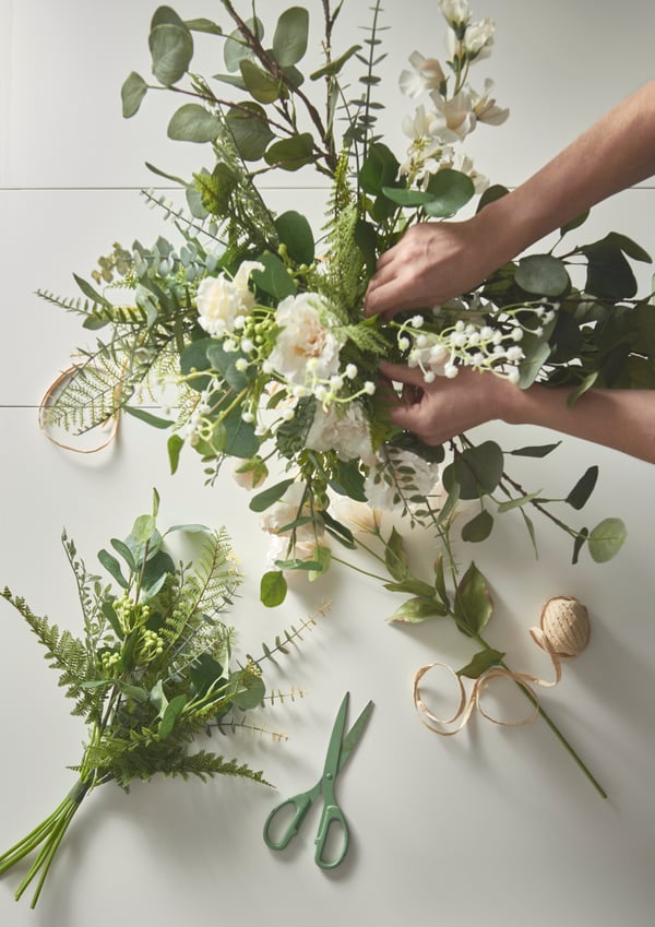 close up of hand tied artifical flower bouquet and SMYCKA