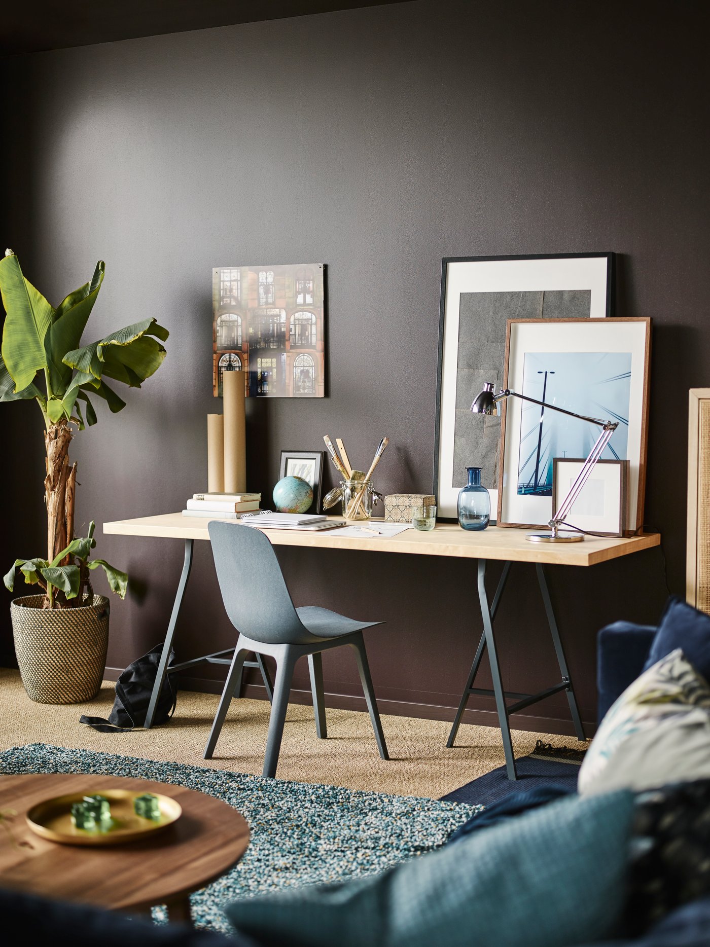 Create a work spot with a grown-up feel in a ‘do it all’ living room! IKEA offers a lot of living room furniture such as this dining table made with IKEA KARLBY worktop in birch and LERBERG trestles in grey.