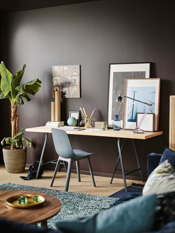 Create a work spot with a grown-up feel in a ‘do it all’ living room! IKEA offers a lot of living room furniture such as this dining table made with IKEA KARLBY worktop in birch and LERBERG trestles in grey.