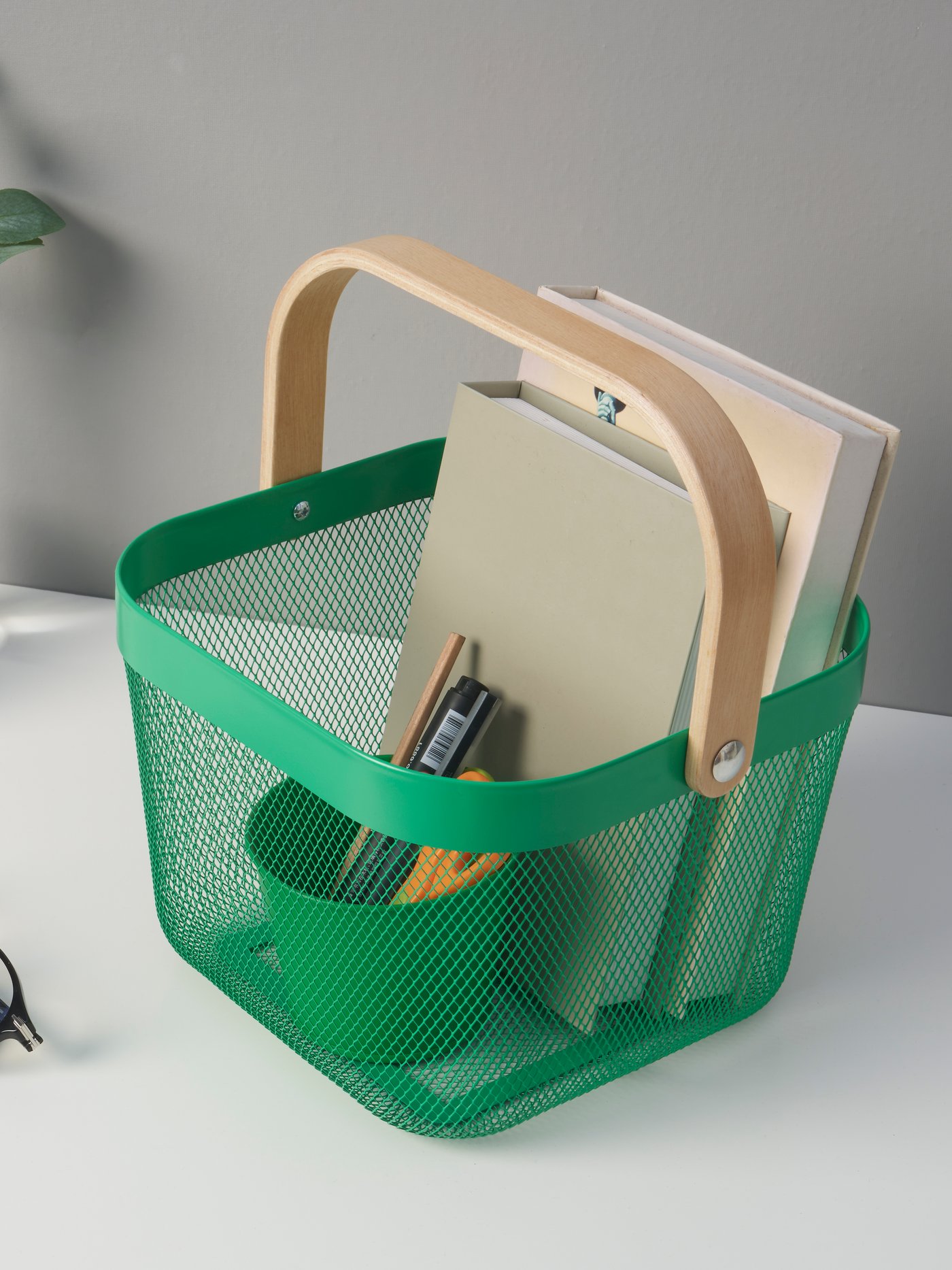 A dark green RISATORP basket