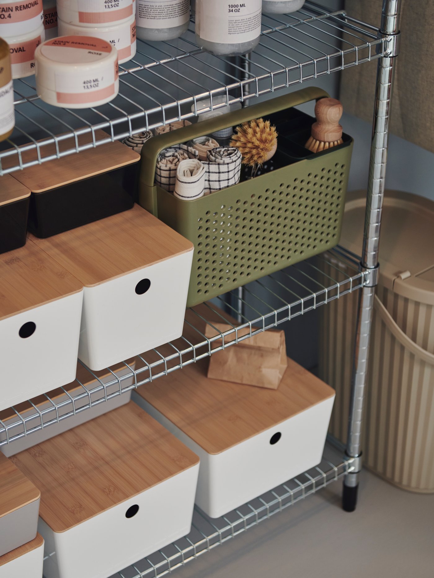 White storage bins in a shelving unit